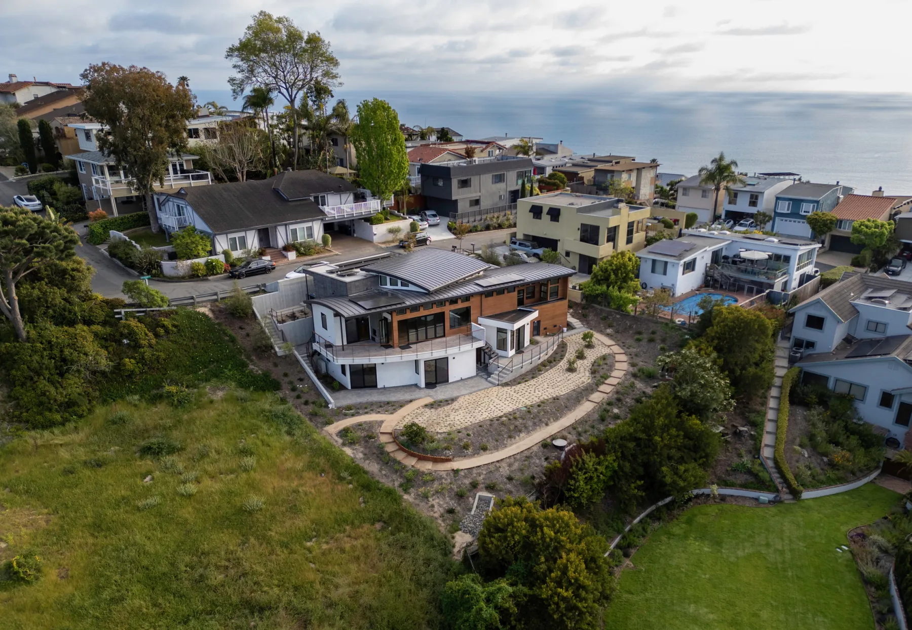 Aerial view of a hillside home above Laguna Beach